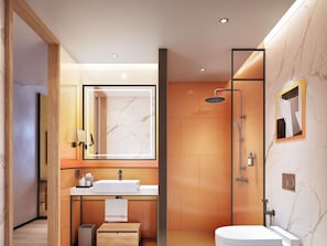 A modern bathroom with a vanity, a shower, and a mirror. - Ibis Bangkok Siam Ratchathewi (Bangkok)