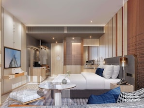 A modern hotel room with a bed, bedside table, lamp, and a TV mounted on the wall. - Mercure Bangkok Siam Ratchathewi (Bangkok)