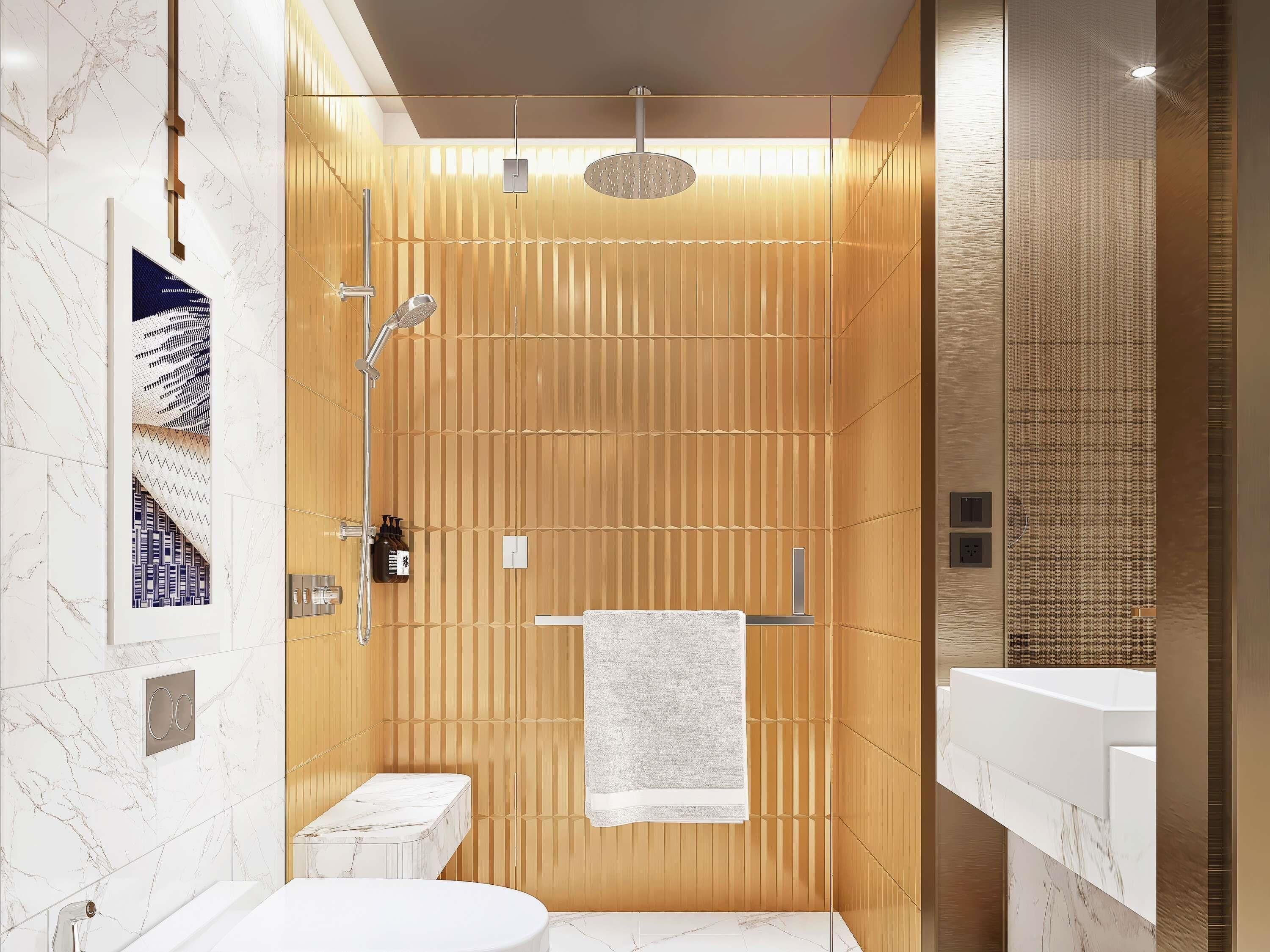 Un baño moderno con ducha, inodoro y lavamanos.