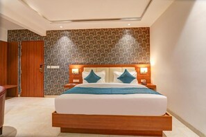 Executive Suite, Balcony, City View | In-room safe, soundproofing, iron/ironing board, free WiFi - NH Skye Suites Hotel  (New Delhi)
