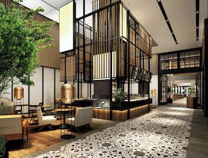 A modern interior with a central seating area, a patterned floor, and a vertical wooden structure.