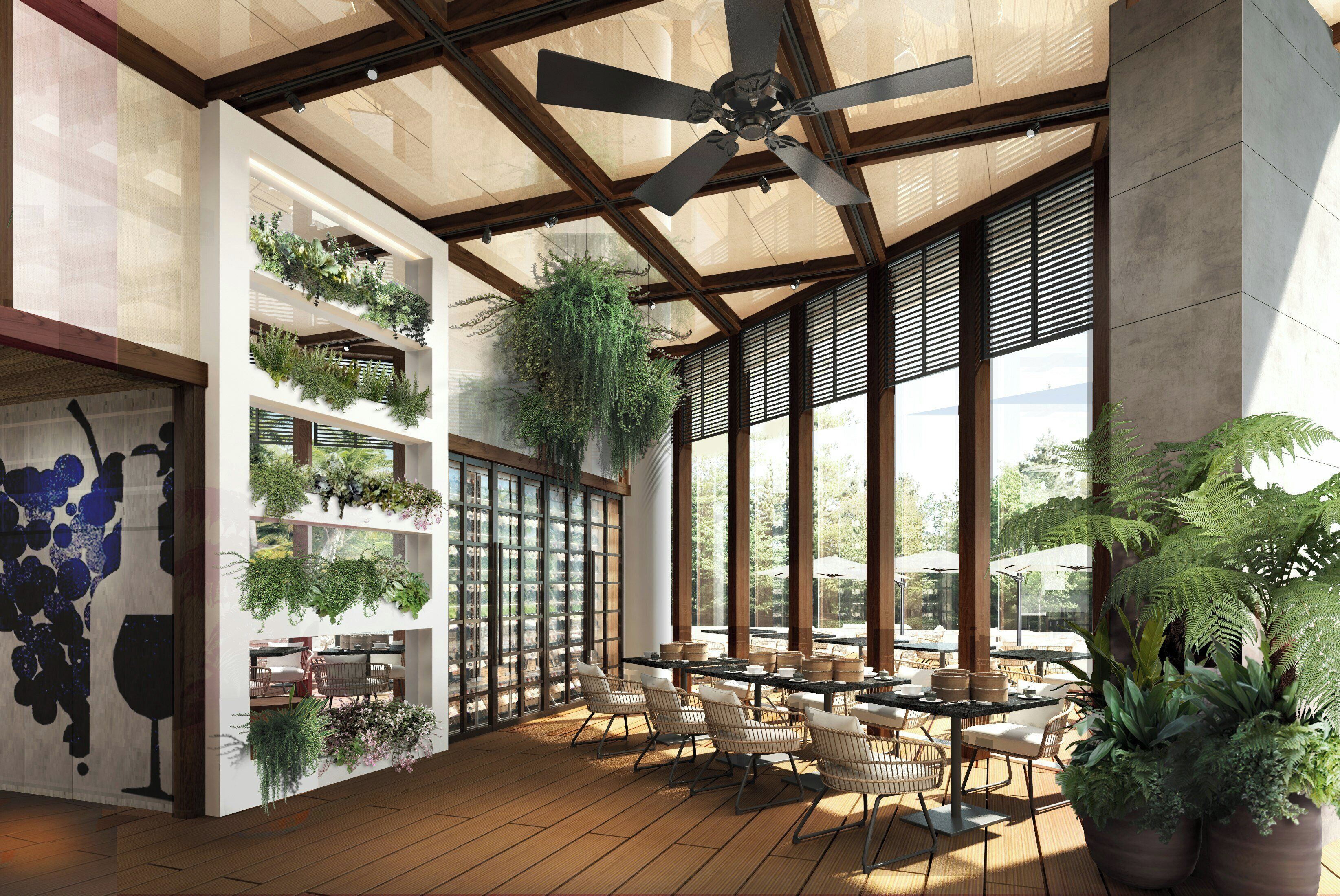 A modern interior with a dining area, wooden flooring, ceiling fans, and large windows.