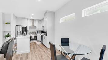Eat and entertain in this bright dining nook with window views.