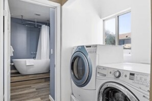 Dedicated laundry area with washer and dryer, ideal for long term stays, extended trips, or refreshing linens during your stay. - Oxnard 4BR Beach & Harbor Retreat w/ BBQ & Deck (Oxnard)