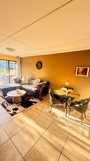 Living area - Lovely 2-bedroom apartment in a safe area in KuGompo City perfect for your stay (KuGompo City)