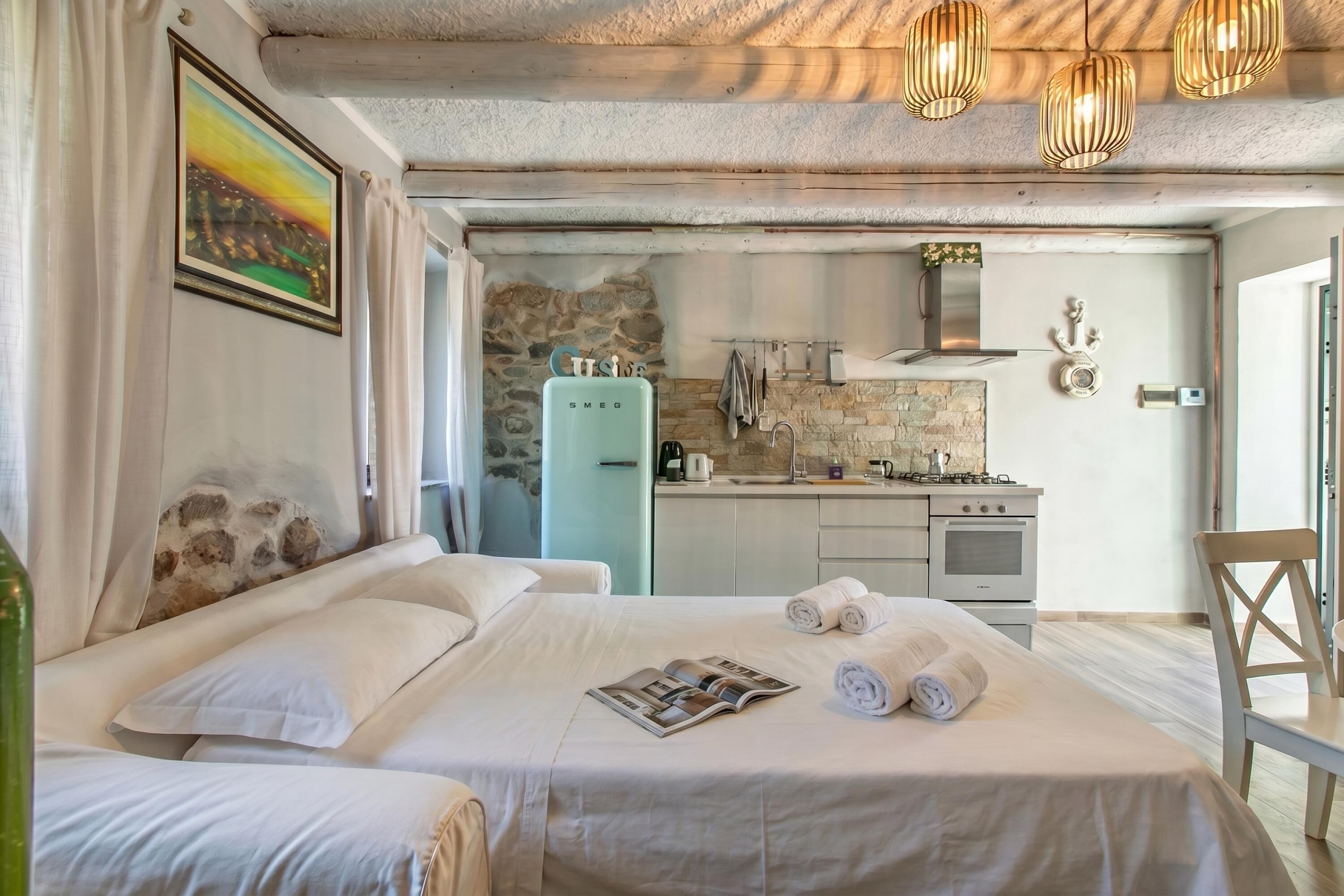 Perhehuoneisto, useita makuuhuoneita (Dimora Della Rocca Private Garden) | 1 makuuhuone, ilmainen Wi-Fi, vuodevaatteet