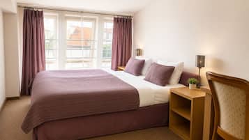 Deluxe Studio Suite, City View | Hypo-allergenic bedding, iron/ironing board, free WiFi, bed sheets