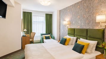 Chambre Deluxe Double ou avec lits jumeaux | Literie hypoallergénique, fer et planche à repasser, Wi-Fi gratuit