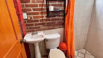 Family Suite, Patio | Bathroom | Shower, towels, soap, shampoo