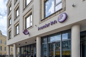 A hotel facade with a prominent 'Premier Inn' sign, large windows, and a modern architectural style. - Premier Inn Halle (Saale) City Centre (Halle (Saale))