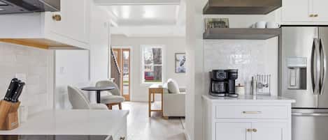 Coffee/tea maker, fridge, microwave, oven