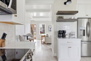 Fridge, microwave, oven, stovetop - Seaside luxury meets unbeatable location. This stylish 2BR/2BA retreat is steps from Dock Square KPT's restaurants, shops, and galleries, and includes beach gear and a private fire pit. (Kennebunk)