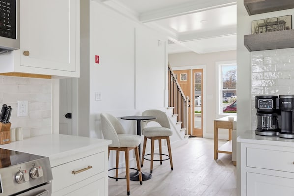 Fridge, microwave, oven, stovetop - Seaside luxury meets unbeatable location. This stylish 2BR/2BA retreat is steps from Dock Square KPT's restaurants, shops, and galleries, and includes beach gear and a private fire pit. (Kennebunk)