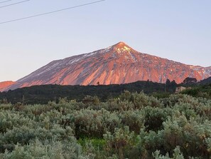 A mountain with a clear sky.