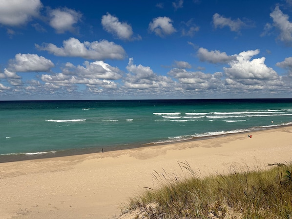 A beach with clear skies and ocean waves. - The Homestead Glen Arbor Condo Lake Michigan (Glen Arbor)