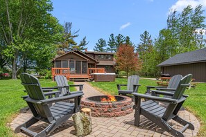 Terrace/patio - The Whitetail Woodlands: Hot Tub, Fire Pit and moments from the beach! (Fennville)
