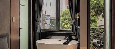 Deluxe Suite, Balcony, Courtyard View | Premium bedding, memory foam beds, minibar, desk