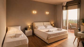Comfort Triple Room, Valley View | Minibar, in-room safe, desk, blackout drapes