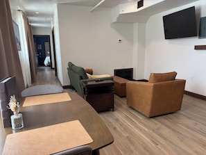 Habitación individual Prestigio | Área de sala de estar