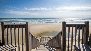 A wooden staircase leading to a beach with a clear sky. - Beachfront Oasis w Dune Walkover, Pool n Spa & More! (Corolla)