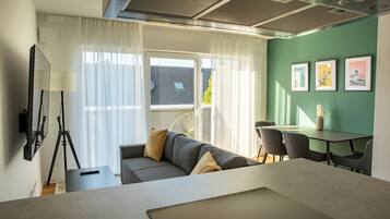 Deluxe Apartment, 2 Single Beds, Balcony | Living area
