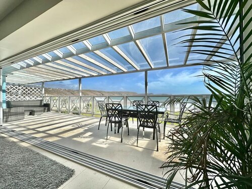The finest beachfront location with private steps onto the sand.