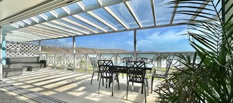 The finest beachfront location with private steps onto the sand.