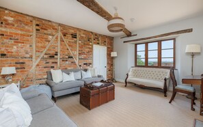 TV, fireplace - The Farmhouse at Nunwell (Brading)