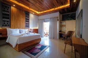 Deluxe Double Room, Pool View | Minibar, in-room safe, desk, laptop workspace - Giri Rose Boutique Hotel (Kuta)