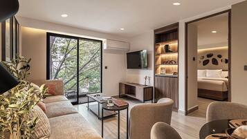 Standard Suite | Living area | 55-inch Smart TV with digital channels