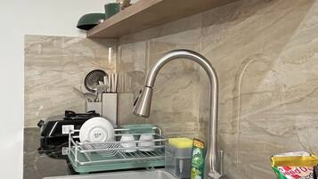 Single Room, 1 Queen Bed, Patio | Private kitchen | Fridge, dishwasher, cookware/dishes/utensils