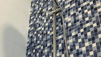 Shower, towels, soap, shampoo
