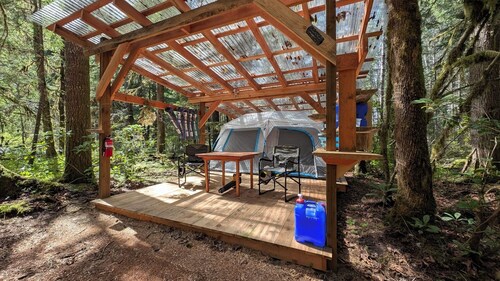 A beautiful glamping unit at Shelter- Castle Rock Farm’s most private forest retreat