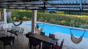 A covered patio with a pool, outdoor furniture, and a grill. - Walk to Secluded Playa Azul, Private Pool, 4 Ocean-view Bedrooms, sleeps 8 (Guanacaste Province)