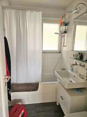 Hair dryer, towels, soap, shampoo