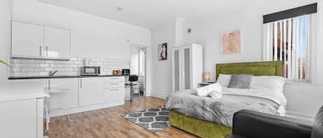 1 chambre, fer et planche Ă repasser, Wi-Fi, draps fournis