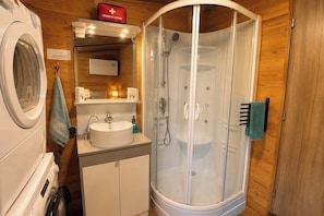 Shower, hair dryer, towels