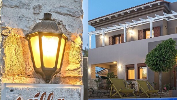 Uma vila chamada 'villa camelia' com um muro de pedra, um candeeiro e uma área de piscina.