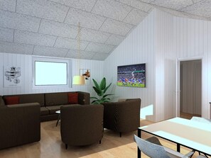 A modern living room with a sofa, armchairs, a dining table, and a television.