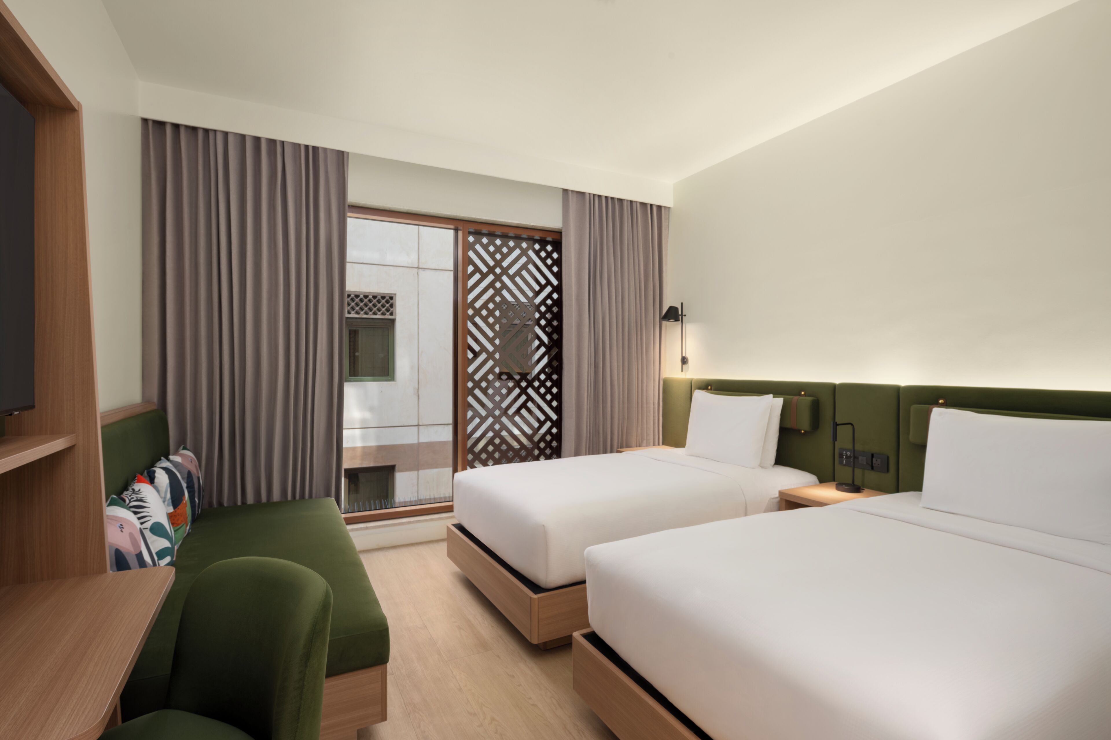 Twin Room, Multiple Beds | Minibar, in-room safe, blackout curtains, soundproofing