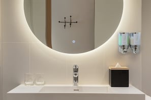 Eco-friendly toiletries, hair dryer, towels, soap