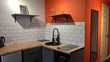 Classic-Doppelzimmer, Gartenblick | Eigene Küche
