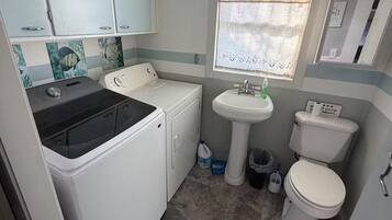 Hair dryer, towels, soap, toilet paper
