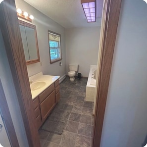 Shower, towels, soap, toilet paper