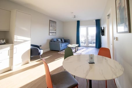 Deluxe Apartment, 1 Bedroom, Balcony, City View | Living area. The Maltings