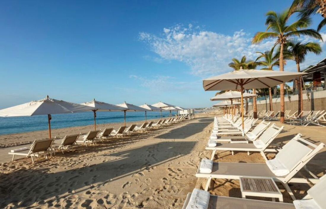 On the beach, sun-loungers, beach towels