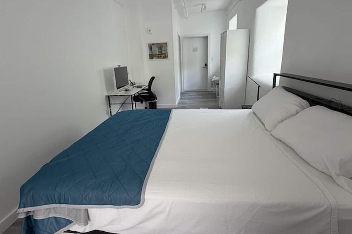 Desk, laptop workspace, WiFi (free), bed sheets