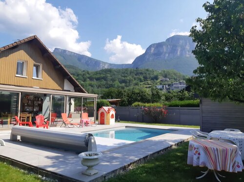 House between lakes and mountains with swimming pool