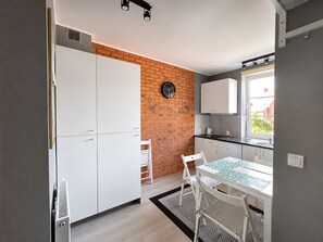 Lägenhet Comfort - utsikt mot trädgården | Restauranger