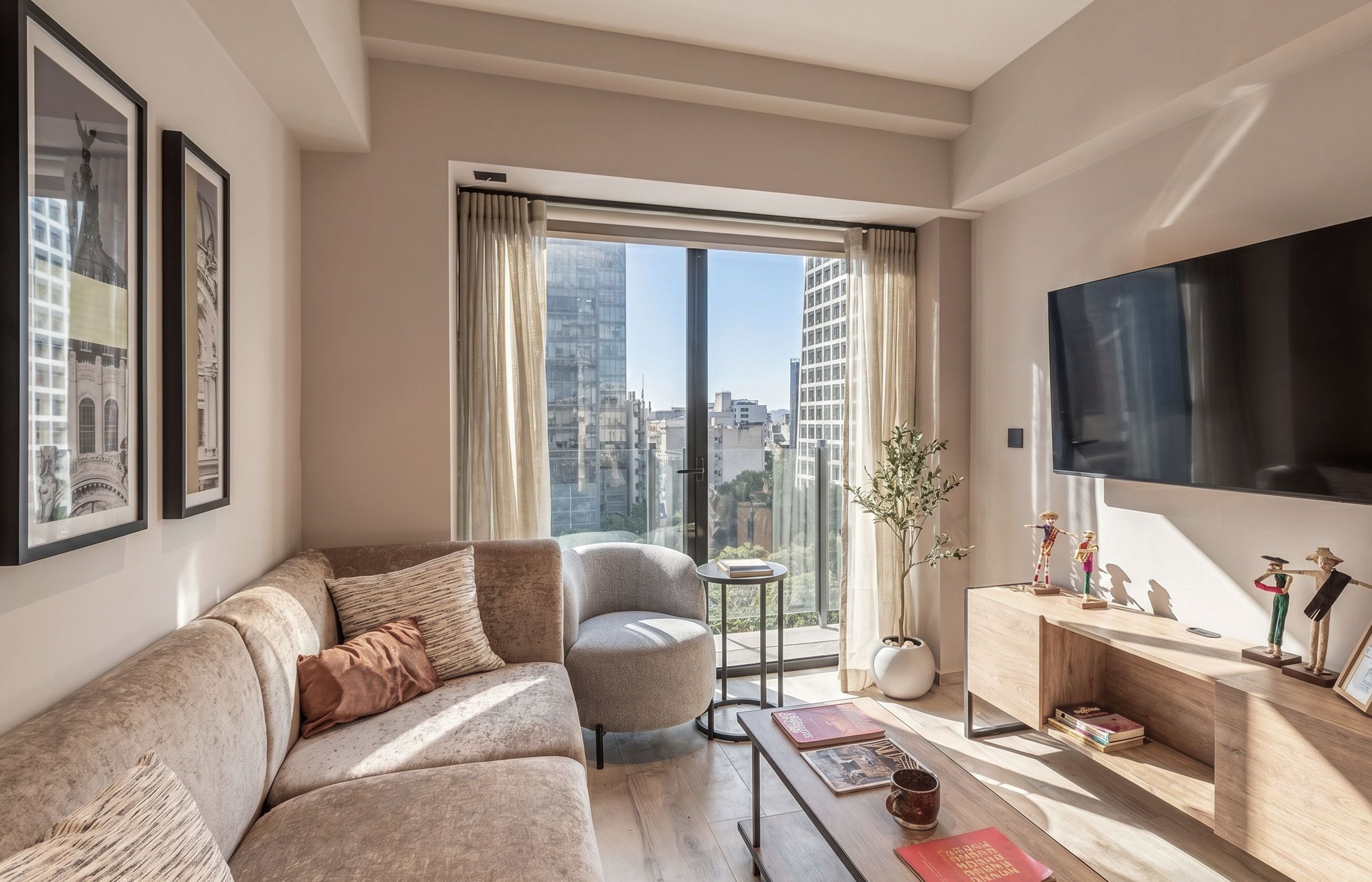 Premium Two Bedroom Apt with Balcony | Living area | 55-inch plasma TV with digital channels